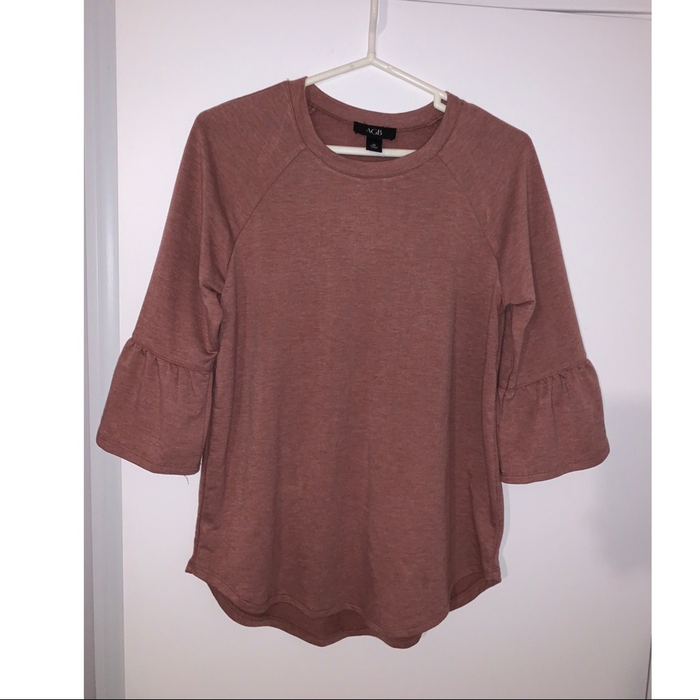Soft, ruffled sleeved top.